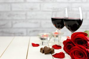 Romantic Valentine's Day Ideas | Two glasses of wine and roses